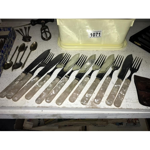 1071 - A quantity of cutlery including boxed sets