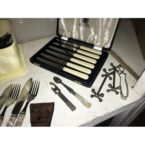 1071 - A quantity of cutlery including boxed sets