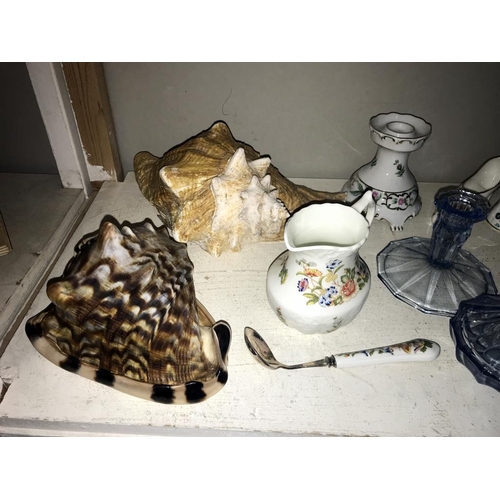 1083 - A mixed lot including conch shells, India Tree, Aynsley, silver plate, trinket pots & candlesticks e... 