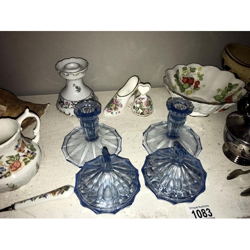 1083 - A mixed lot including conch shells, India Tree, Aynsley, silver plate, trinket pots & candlesticks e... 