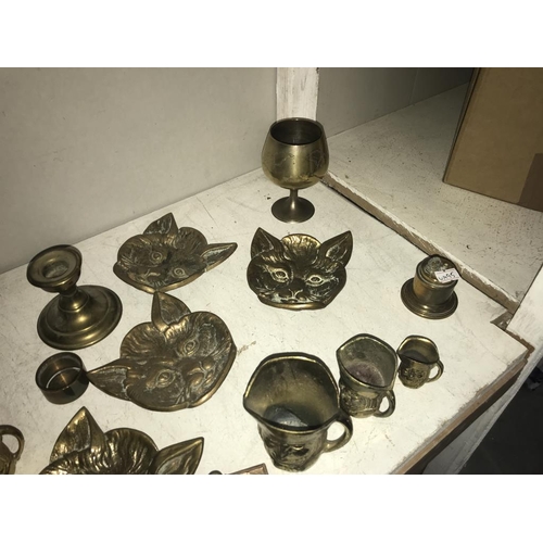 1084 - A selection of brassware including cat head, dishes & crocodile nut cracker etc.