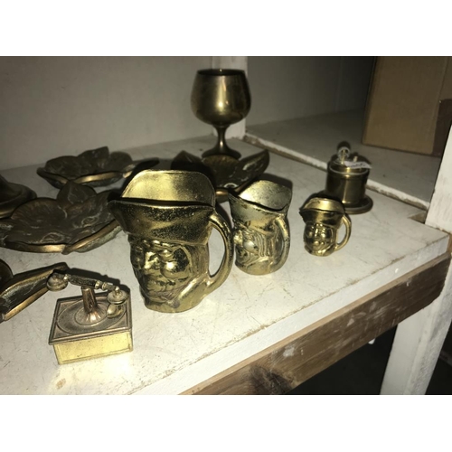 1084 - A selection of brassware including cat head, dishes & crocodile nut cracker etc.