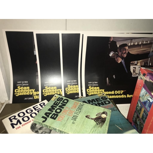 1090 - A quantity of James Bond related items including James Bond The Legacy by John Cork & Bruce Scivally... 