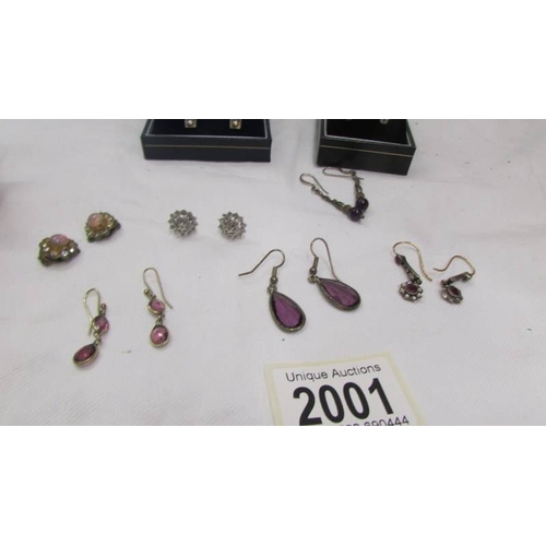 2001 - Two pairs of silver earrings and six other pairs of earrings.