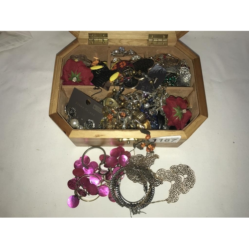 1167 - A wooden jewellery box of rings & earrings