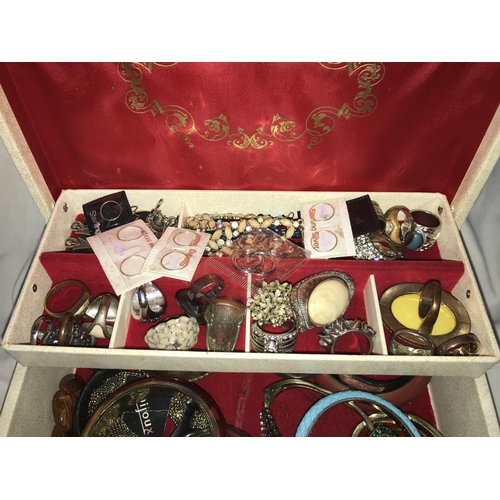 1202 - A white jewellery box with assorted bangles, bracelets, rings & earrings