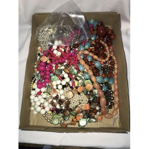 1210 - A box of beaded costume jewellery