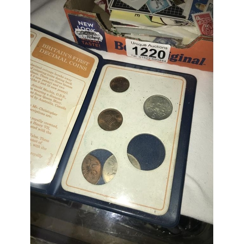 1220 - A tin of six pence coins & small lot of mixed stamps etc.