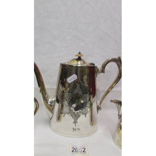 2052 - A three piece silver plate tea set.