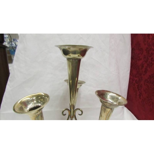 2054 - A silver plate four trumpet epergne.