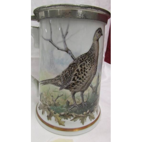 2058 - A Franklin Mint limited edition porcelain 'The Game Bird' Stein, 18cm tall.