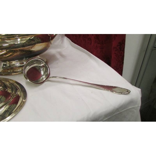 2062 - A superb quality silver plate soup tureen with ladle.