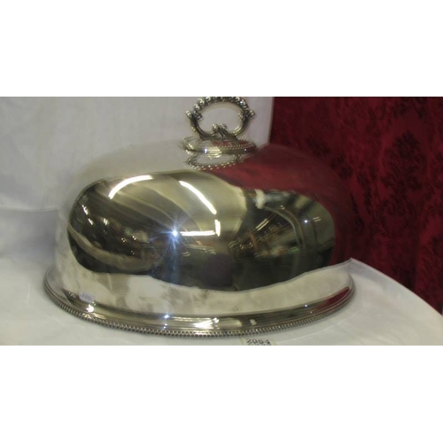 2064 - A large silver plate meat cover, 40 x 35 cm.