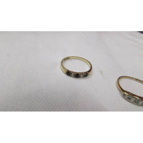 2066 - Five 9ct gold rings (total weight with stones 9.3 grams).