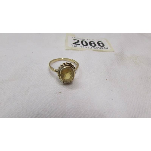 2066 - Five 9ct gold rings (total weight with stones 9.3 grams).