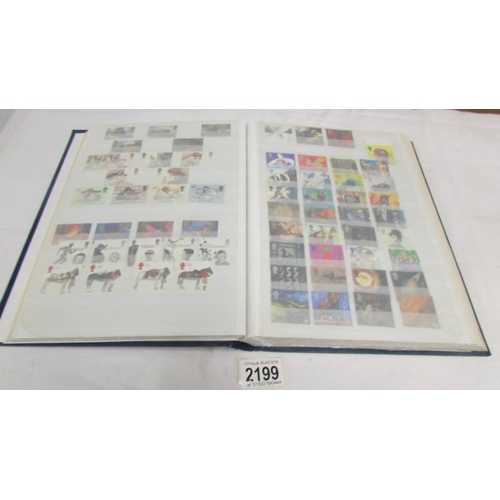 2199 - A good album of mint definitive stamps and sets (some in strips, many with gutter sides), approximat... 