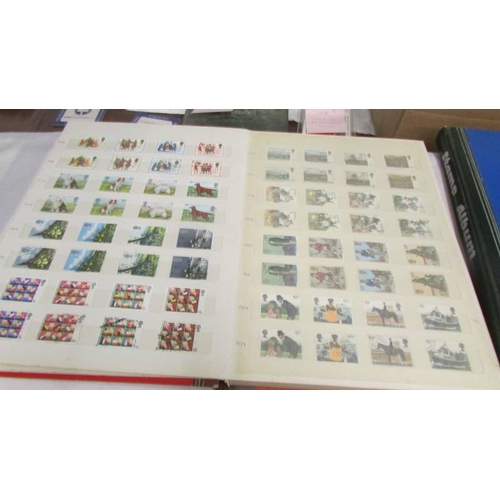 2200 - Two good albums of mint and many fine used matching stamp sets, 1957 - 1989 and some earlier. (face ... 