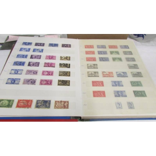 2200 - Two good albums of mint and many fine used matching stamp sets, 1957 - 1989 and some earlier. (face ... 