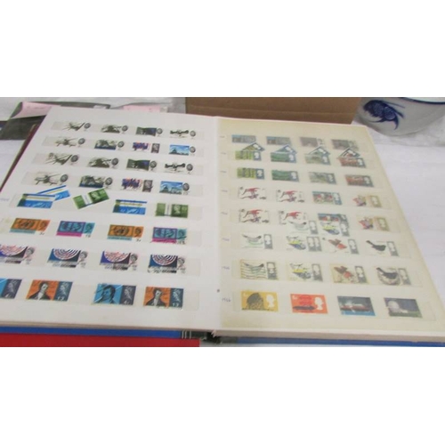 2200 - Two good albums of mint and many fine used matching stamp sets, 1957 - 1989 and some earlier. (face ... 