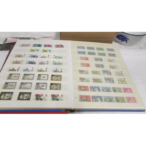 2200 - Two good albums of mint and many fine used matching stamp sets, 1957 - 1989 and some earlier. (face ... 