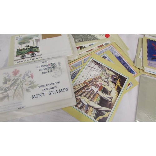 2201 - In excess of 200 assorted postcards, stamped envelopes etc.,