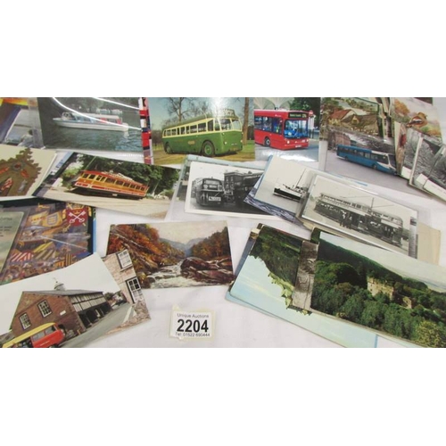 2204 - In excess of 200 postcards including transport, wildlife, topographical etc.,