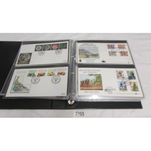 2205 - An album of approximately 140 first day covers including R A F, Railway, Football, Royalty, Historic... 