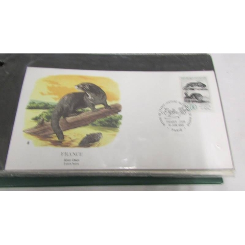 2206 - 4 Albums of first day covers being 2 Russian, 1 Flora and Fauna and one other.