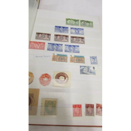 2207 - Five albums of world stamps including UK, New Zealand, Australia, Magyar, Nigeria, Lesotho, South Af... 