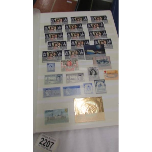 2207 - Five albums of world stamps including UK, New Zealand, Australia, Magyar, Nigeria, Lesotho, South Af... 