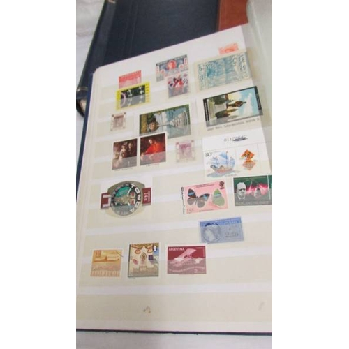 2207 - Five albums of world stamps including UK, New Zealand, Australia, Magyar, Nigeria, Lesotho, South Af... 