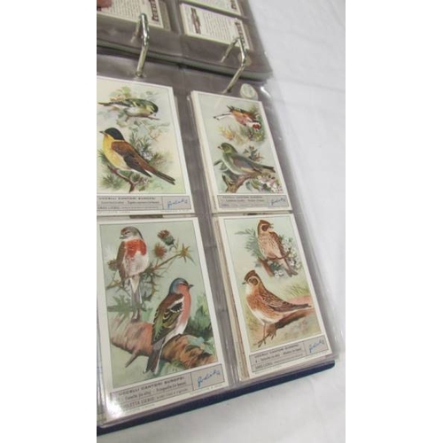 2213 - An album of early 20th century cigarette cards (1915-1930's) including Will's, Player's, Gallaher et... 