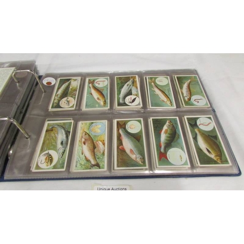 2213 - An album of early 20th century cigarette cards (1915-1930's) including Will's, Player's, Gallaher et... 