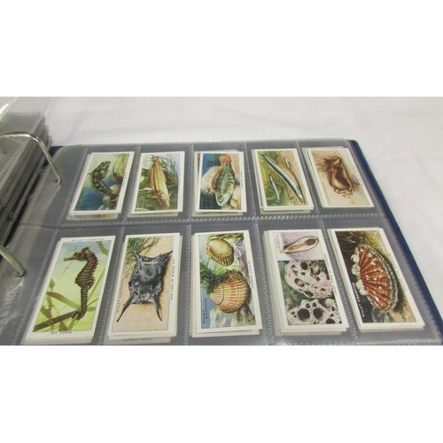 2213 - An album of early 20th century cigarette cards (1915-1930's) including Will's, Player's, Gallaher et... 