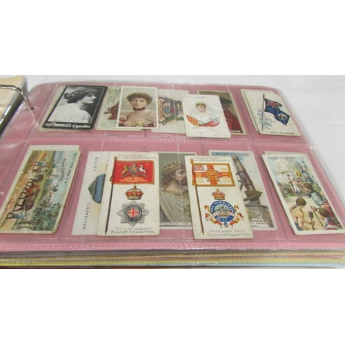 2215 - An album of late 19th/early 20th cigarette cards including Will's, Player's, Ogden's, Carreras etc.,... 