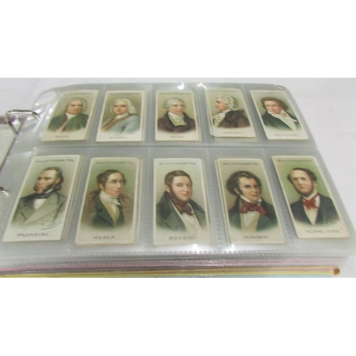 2215 - An album of late 19th/early 20th cigarette cards including Will's, Player's, Ogden's, Carreras etc.,... 