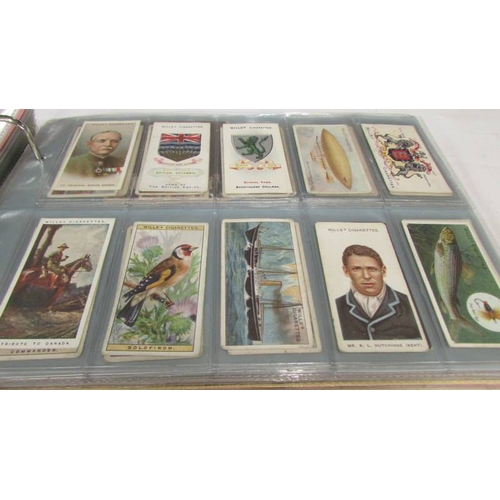 2215 - An album of late 19th/early 20th cigarette cards including Will's, Player's, Ogden's, Carreras etc.,... 