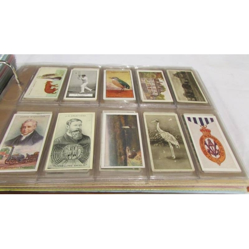 2215 - An album of late 19th/early 20th cigarette cards including Will's, Player's, Ogden's, Carreras etc.,... 