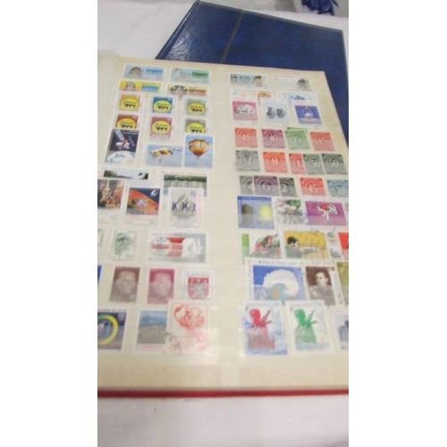 2217 - Four albums of assorted world stamps.