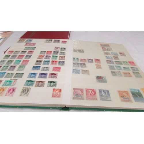 2218 - Three albums of assorted world stamps.