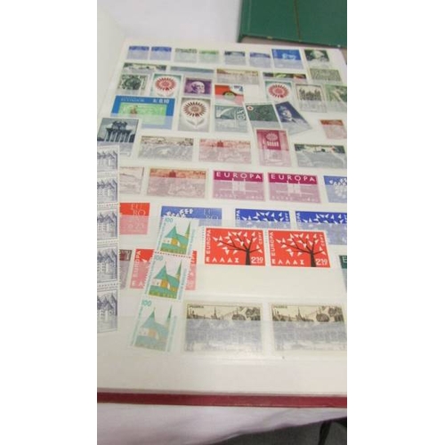 2218 - Three albums of assorted world stamps.