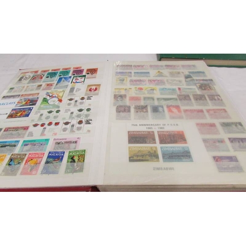 2218 - Three albums of assorted world stamps.