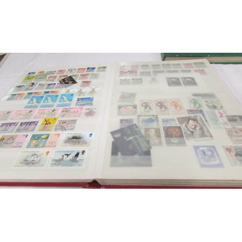 2218 - Three albums of assorted world stamps.