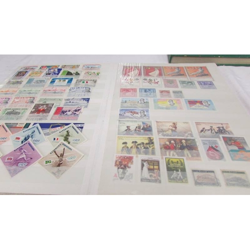 2218 - Three albums of assorted world stamps.