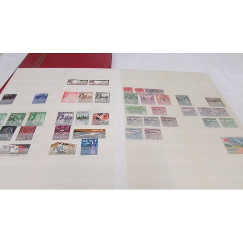 2218 - Three albums of assorted world stamps.