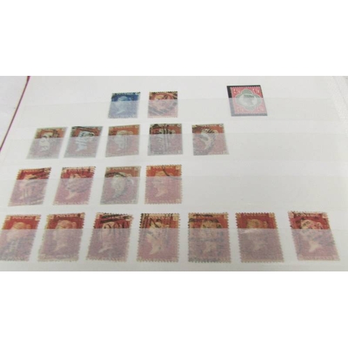 2219 - Three albums of UK and world stamps including Victorian penny reds.