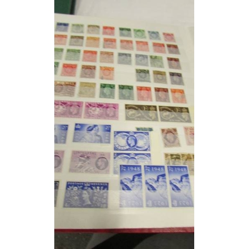 2219 - Three albums of UK and world stamps including Victorian penny reds.