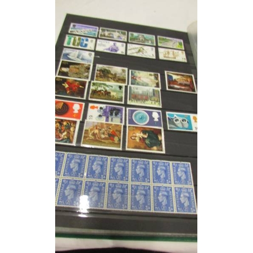 2219 - Three albums of UK and world stamps including Victorian penny reds.