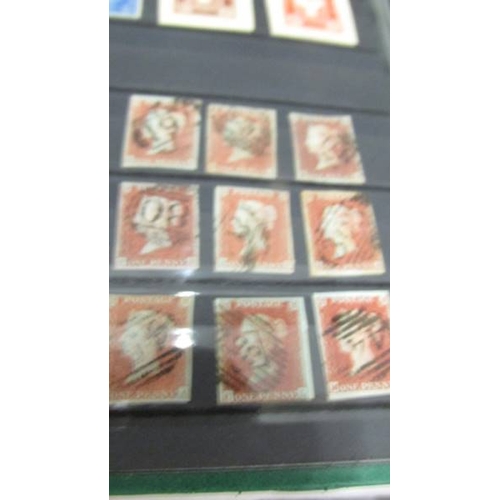 2219 - Three albums of UK and world stamps including Victorian penny reds.