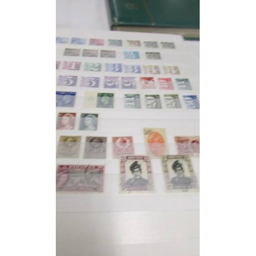 2219 - Three albums of UK and world stamps including Victorian penny reds.